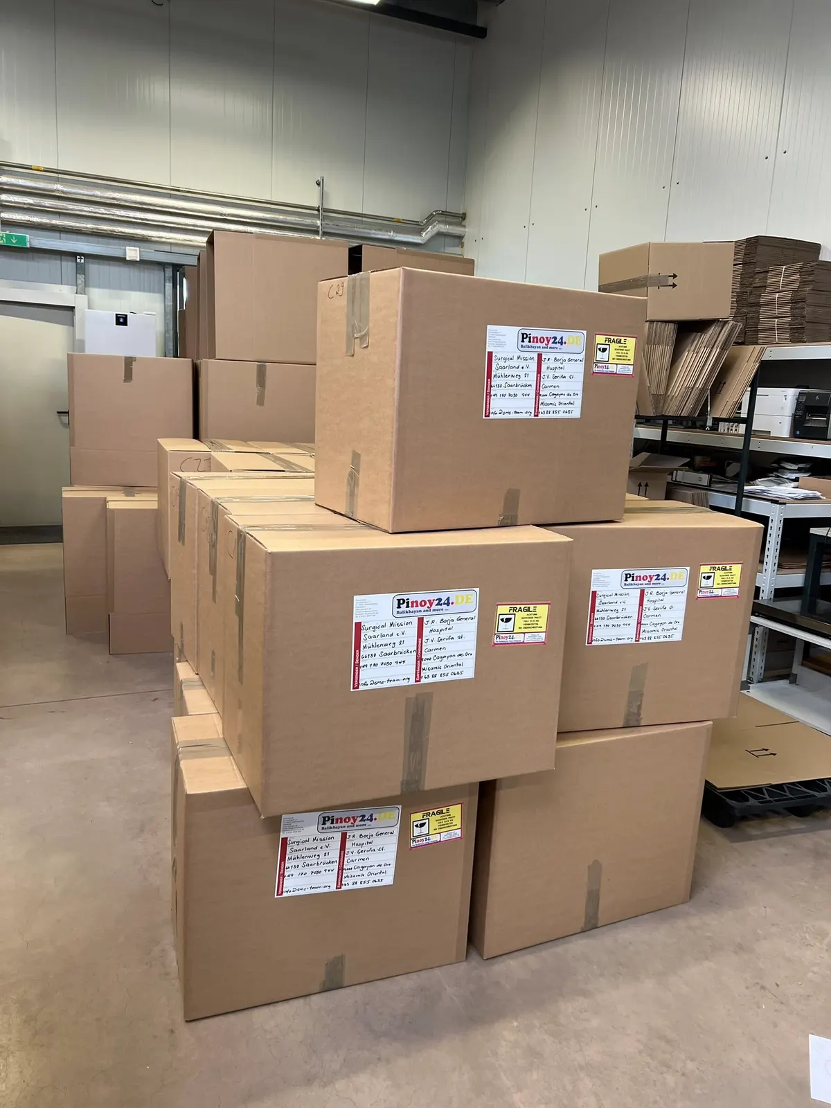 A stack of packed, labelled boxes in the warehouse
