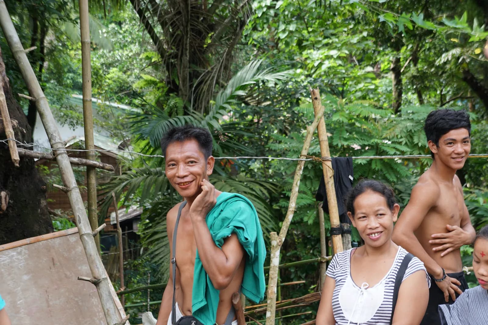 Smiling people in a village in the Philippines